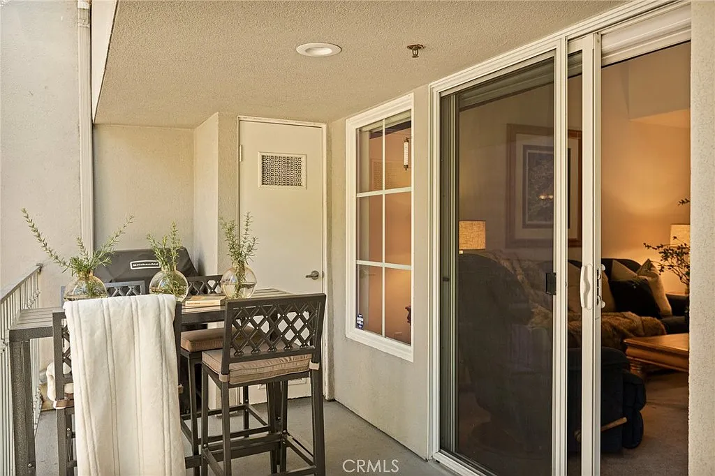 306 Villa Way — Covered balcony seating