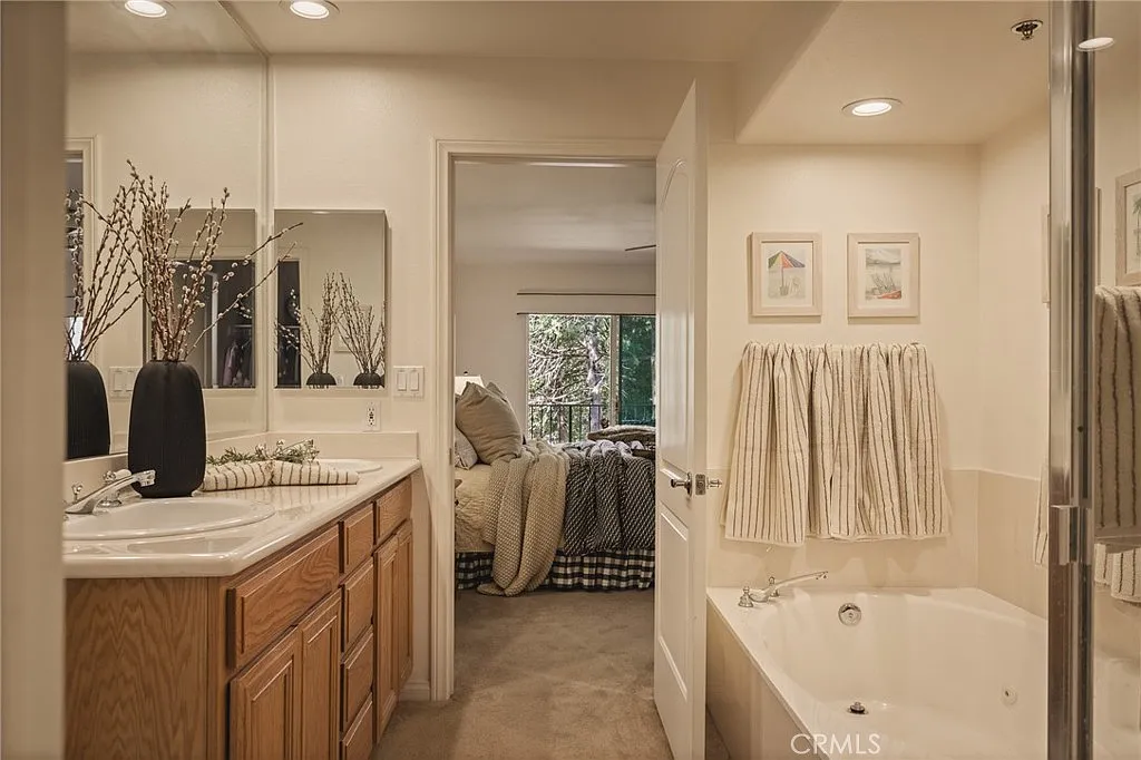 306 Villa Way — Primary bathroom with dual vanity and soaking tub